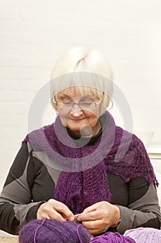 Handcraft - Old woman knitting