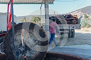 handcrafted agave grinding mill in oaxaca photo