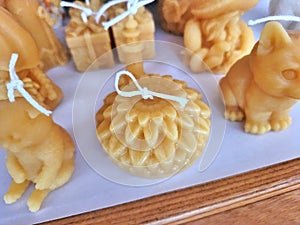 Handcrafted beeswax candle flower. Hand-poured pure natural beeswax candles.