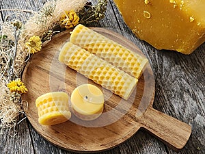 Handcrafted beeswax candles. Bee Honeycomb Hand-poured pure natural beeswax candle.