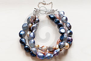 Handcrafted bracelet from river pearls close up