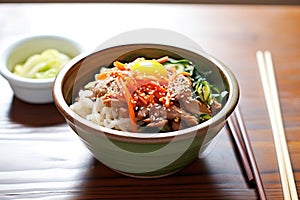 handcrafted ceramic bowl of bibimbap