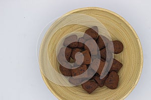 Handcrafted Chocolate Truffles on Bamboo Plate