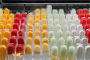 Handcrafted Fresh Fruit Fruits Popsicles neatly arranged in Rows on the Counter for Sale