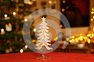 Handcrafted Glass Christmas Tree in Christmassy Room Situation photo
