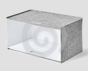 Handcrafted gray felt box with white inner lining and slotted handles