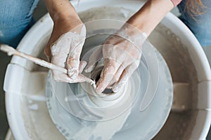 Handcrafted on a potter`s wheel,Hands make clay from various items for home and sale in the store and at the exhibition, ceramic i