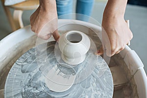 Handcrafted on a potter`s wheel,Hands make clay from various items for home and sale in the store and at the exhibition, ceramic i