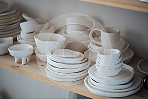 Handcrafted on a potter`s wheel,Hands make clay from various items for home and sale in the store and at the exhibition