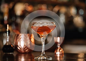 A handcrafted specialty brown liquor cocktail