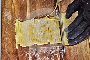 Handcrafted Tagliatelle on Rustic Board - Close-Up