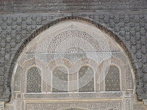 Handcrafted windows of the Medersa Ben Youssef in Marrakech. Morocco