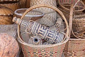handcrafts covering glass bottles of rattan weave