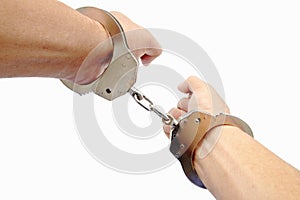 Handcuff in a hand