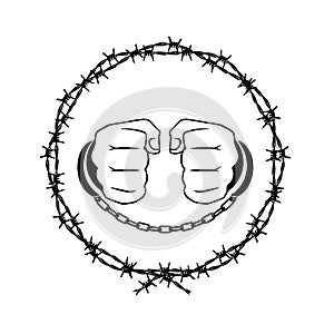 Handcuffed hands in a barbed wire wreath