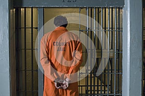 Handcuffed Prisoner In Jail