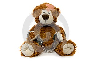handcuffed Teddy bear.
