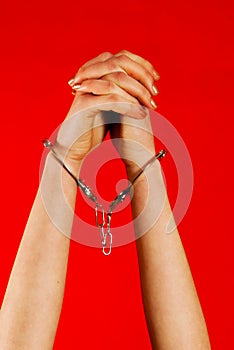 Handcuffed woman's hands