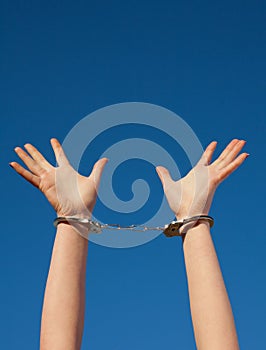 Handcuffed woman's hands