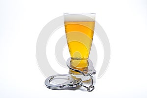 Handcuffs and Beer Glass photo