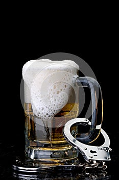 Handcuffs on the handle of a beer mug
