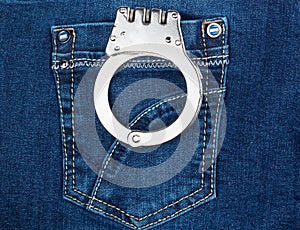 Handcuffs in jeans pocket