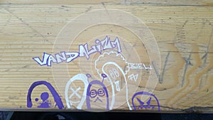 Handdrawn graffiti Art on wooden Table