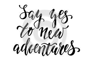 Handdrawn lettering of a phrase Say yes to new adventures photo