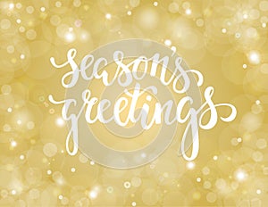 Handdrawn lettering season`s greetings. design for holiday greeting cards and invitations