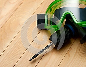 Handdrill and goggles