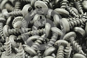 A handful of black mounting screws