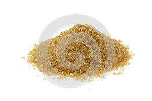 A handful of brown cane sugar