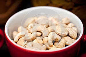 Handful of cashews in a cup