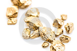 Handful of gold nuggets close-up