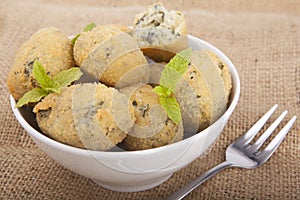 A handful of homemade croquettes of spinach