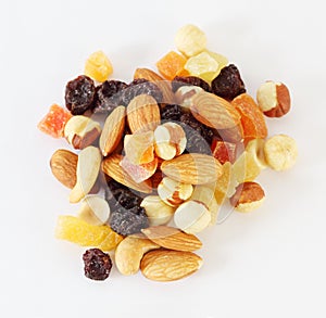 Handful of nuts, dried fruits and candied fruits photo