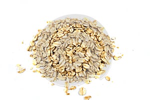 Handful of raw rolled oats. Isolated