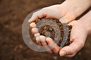 Handful of Rich Brown Soil