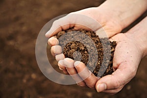 Handful of Rich Brown Soil photo