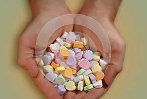 Handful of Valentine candy.