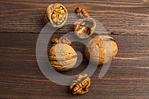 Handful of Walnuts on wooden background