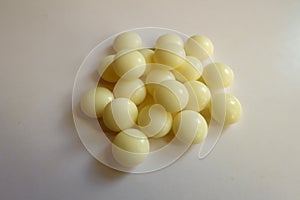 Handful of yellow mints of xylitol