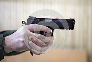 Handgun aims
