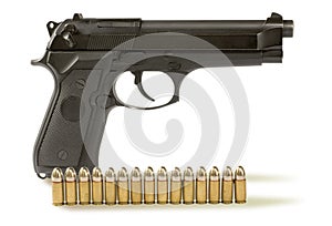 Handgun and fifteen bullets photo