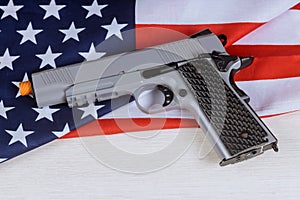 Handgun pistol on American flag crime and punishment