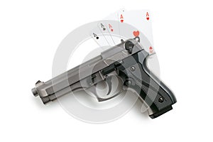 Handgun and poker cards