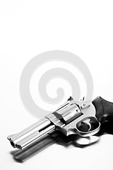 Handgun on steel surface