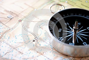 Handheld compass on a map