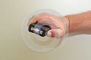 A handheld taser