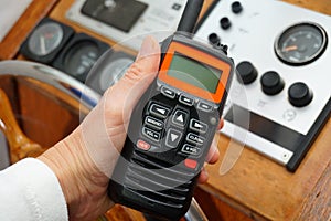 Handheld VHF held to transmit a message from the water and sea. For pleasure craft to call for help if there is a mayday.